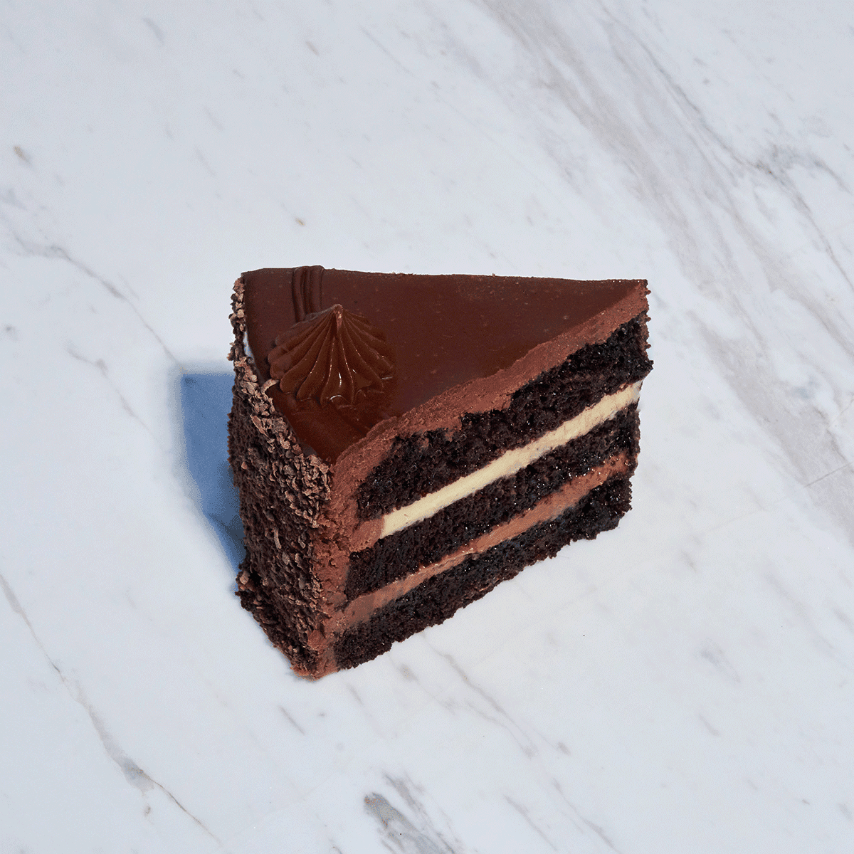 TORTA-DE-CHOCOLATE-PORCIÓN-WEB.png